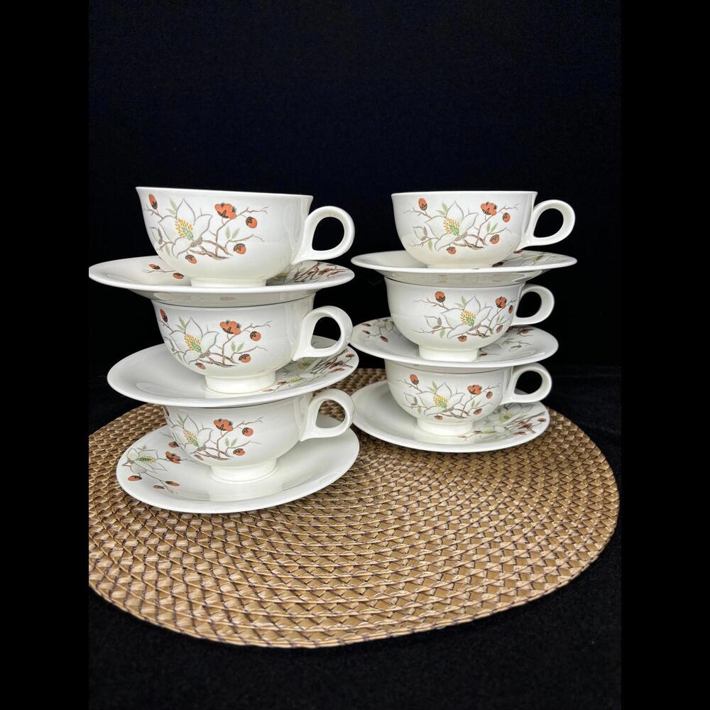 Elegant Tea Cups and Saucers by designer Eva Zeisel - Modern Craft Collection